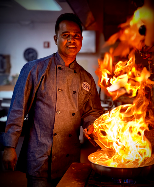 Chef Thushara at the flame